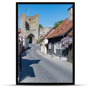 Narrow street in the historical old town in Visby, Sweden