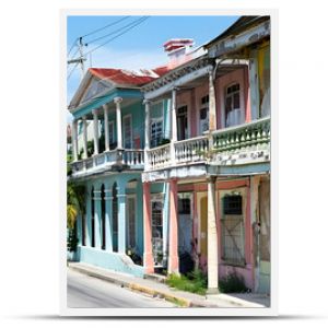 Historic Jamaican buildings in classic Georgian style architecture, lining the streets of downtown Kingston.