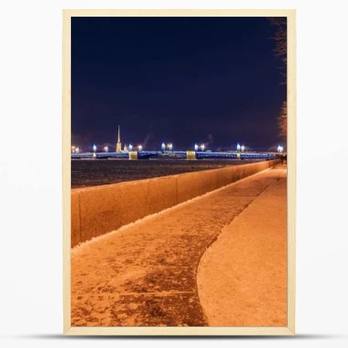 Admiralty Embankment at night in St. Petersburg in winter