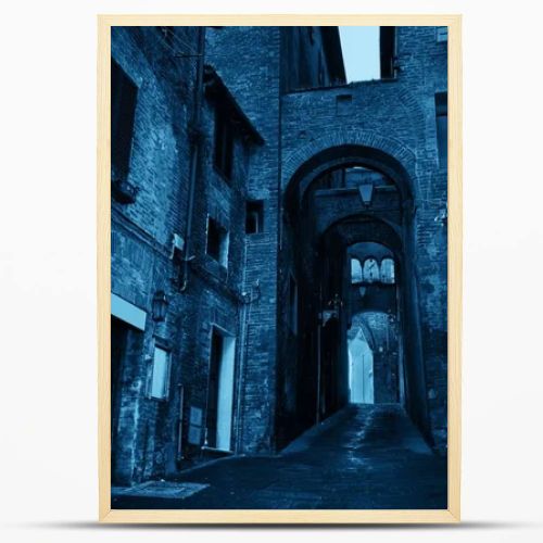 old buildings and archway in Siena