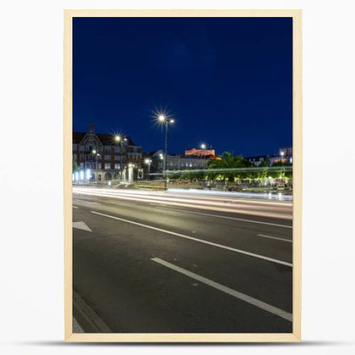 One of the central streets of Katowice after sunset