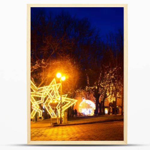 POPRAD, SLOVAKIA - Januar 2018 - St. Egidius street at night with christmas decorations and lights, Poprad, Slovakia, Europe. 