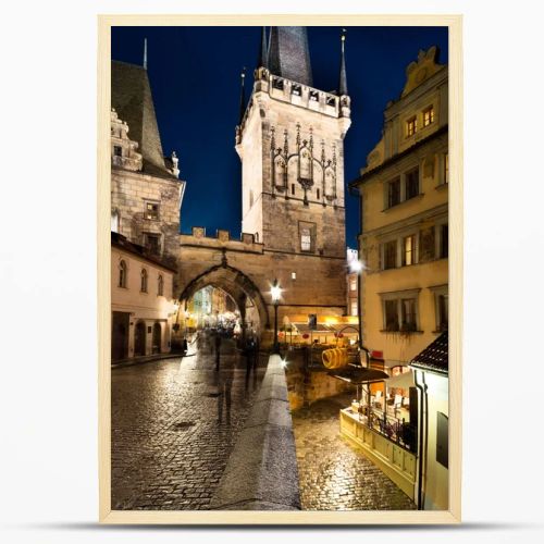 Charles Bridge Tower on a rainy night in Prague