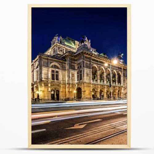 Wien opera building facade at night and traffic trails