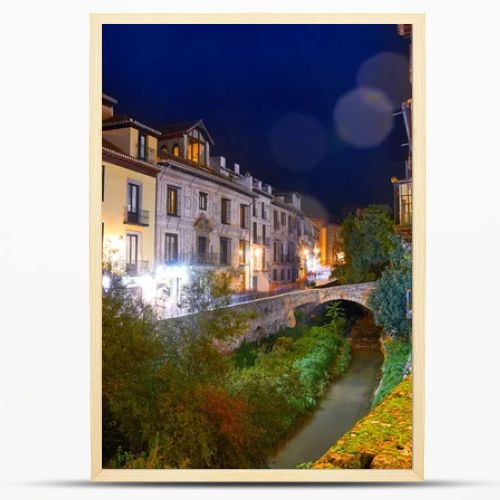 Darro carrera street river and arch in Granada of Spain at Andalusia