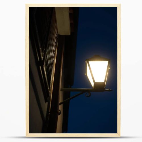 Street lamp in the city of Cres in the evening