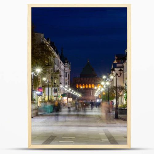 Nizhny Novgorod / Russia - October 16, 2019: Bolshaya Pokrovskaya street. The light of the street lamps. City at dusk. Evening cityscape. Long exposure.