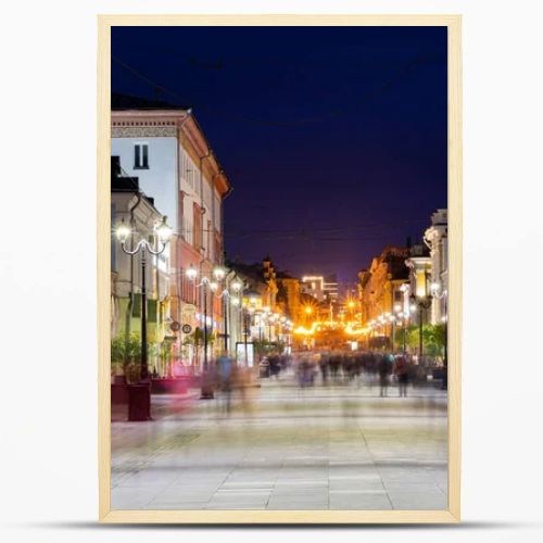 Nizhny Novgorod / Russia - October 16, 2019: Bolshaya Pokrovskaya street. The light of the street lamps. City at dusk. Evening cityscape. Long exposure.