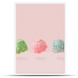 Ice cream scoops against pastel pink background. Minimal summer food concept.