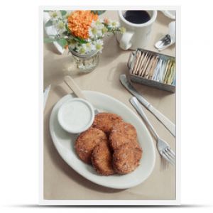 Country style fried green tomatoes on inside of a restaurant