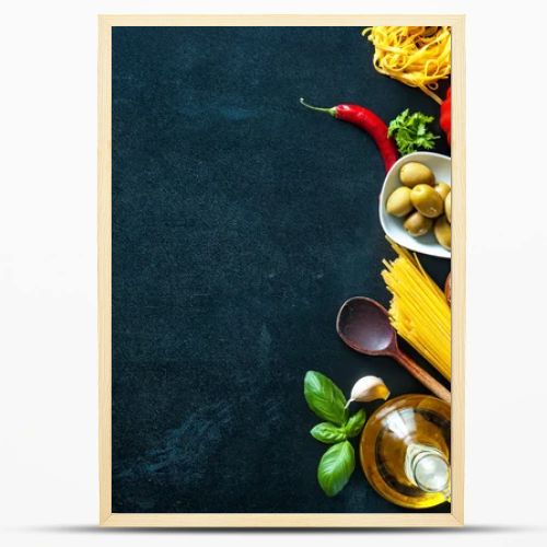 Italian food ingredients on slate background