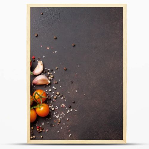 Tomatoes, basil and spices on stone table. Cooking concept. Top view with space for your text