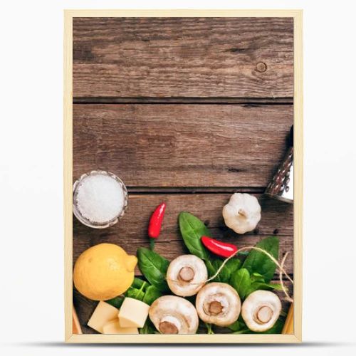 Italian food ingredients for the preparation pasta on wooden background