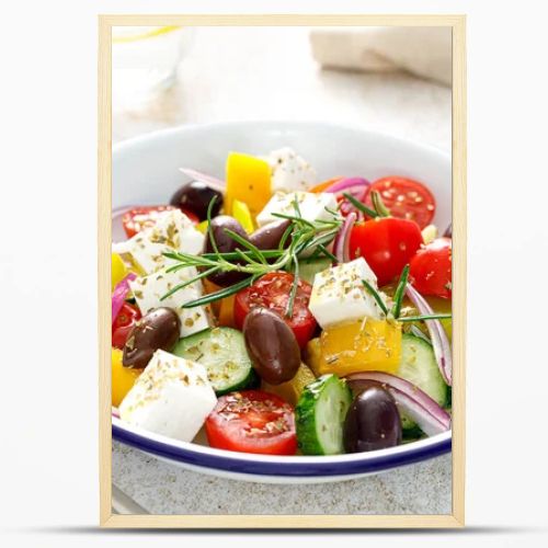 Greek salad. Vegetable salad with feta cheese, tomato, olives, cucumber, red onion and olive oil. Healthy vegetarian mediterranean diet food