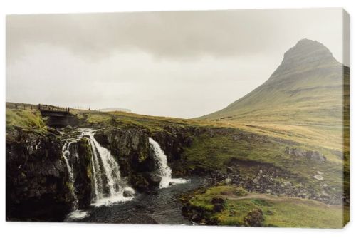amazing landscape with majestic scenic waterfall in Iceland 
