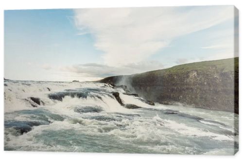 beautiful waterfall landscape with flowing river in Iceland 