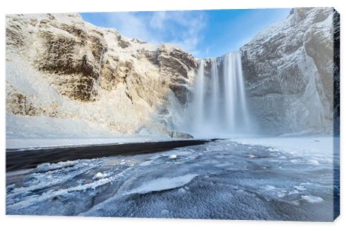 Beautiful Skogafoss waterfall in winter. Iceland.