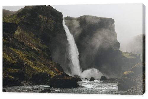 scenic shot of Haifoss waterfall with mist around, Iceland