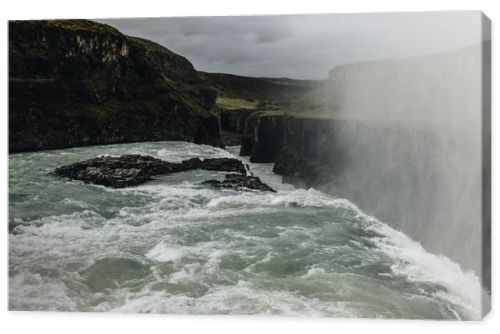 scenic view of steam above beautiful Gullfoss waterfall in Iceland