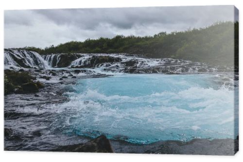scenic view of beautiful Bruarfoss waterfall on Bruara river in Iceland