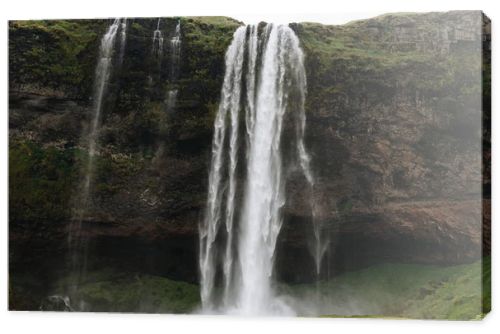 scenic view of beautiful Seljalandsfoss waterfall in highlands in Iceland 