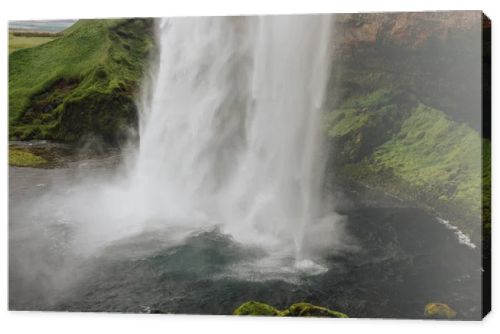 close up view of Seljalandsfoss waterfall in highlands in Iceland 