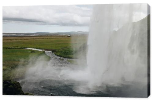 scenic view of Seljalandsfoss waterfall in highlands in Iceland 