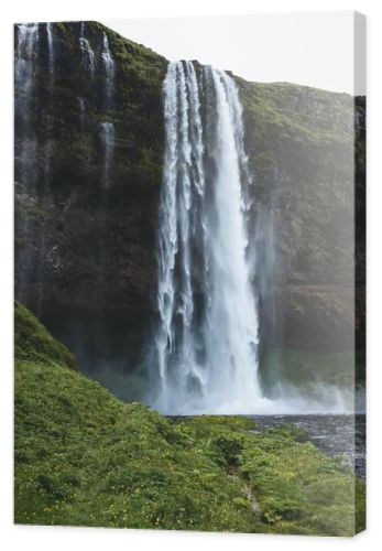 scenic view of landscape with Seljalandsfoss waterfall in highlands in Iceland 