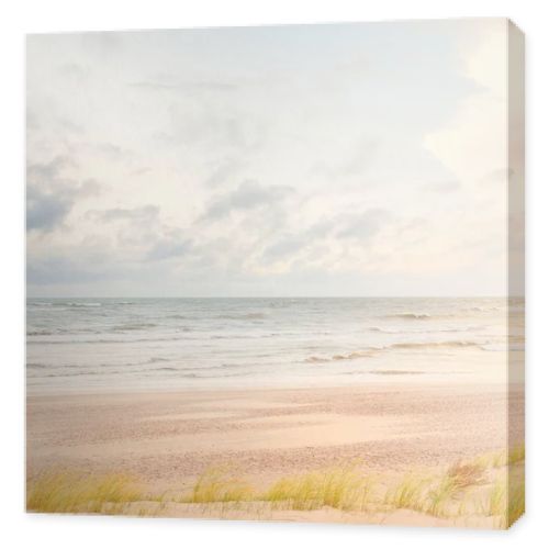 Baltic sea coast (sand dunes) after the storm at sunset. Clear sky, glowing clouds, wind. Autumn landscape. Nature, environmental conservation, ecology, ecotourism, local travel