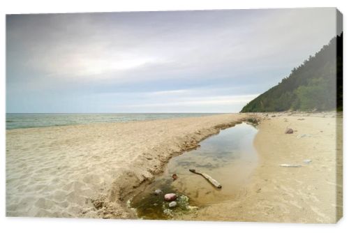 Natural landscape from the sea on a cloudy windy day.