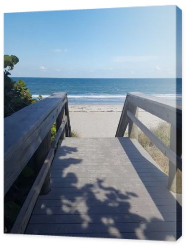 Wooden Boardwalk Path Leading to Sandy Beach and Atlantic Ocean