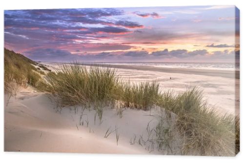 Sunset View from dune top over North Sea from the island of Ameland, Friesland, Netherlands