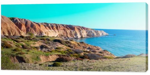 Maslin Beach, located 42 km south of Adelaide on South Australias Fleurieu Peninsula, is renowned for its pristine white sands, clear turquoise waters, and dramatic ochre cliffs. As Australias first legal clothing-optional beach, established in
