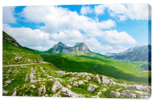 rocky mountains and blue cloudy sky in Durmitor massif, Montenegro