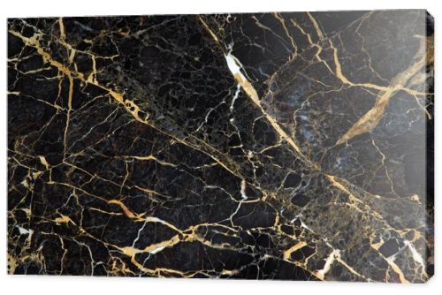 The surface of the slab of dark expensive marble with yellow and white veins is called New Portoro
