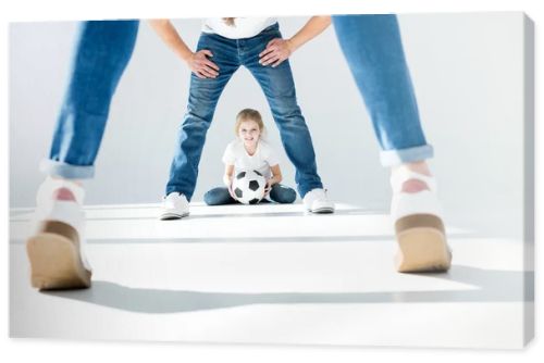 family with soccer ball