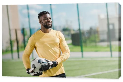 african american goalkeeper with ball