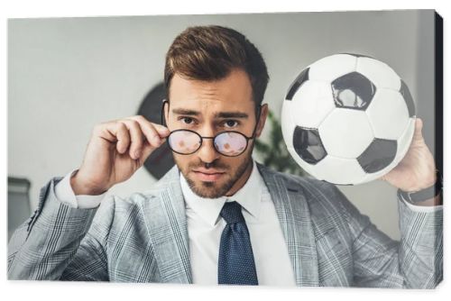 businessman with soccer ball