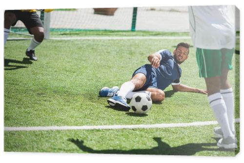 soccer players at pitch