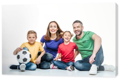 Happy family with soccer ball