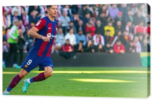 Madrid, Spain- November 25, 2023: League match between Rayo Vallecano and F.C Barcelona in Madrid. Lewandoski with the ball. Football players.