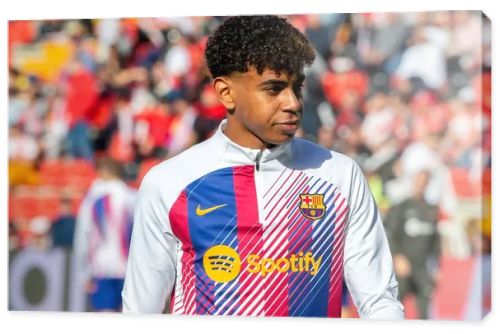 Madrid, Spain- November 25, 2023: League match between Rayo Vallecano and F.C Barcelona in Madrid. Lamine Yamal with the ball. Football players.