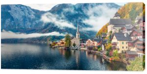 Misty autumn scene of Hallstatt lake. Splendid morning viev of Hallstatt village, in Austria's mountainous Salzkammergut region, Austria. Beauty of countryside concept background.