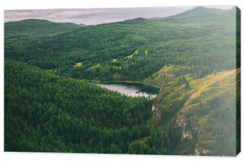 majestic mountains covered with trees and beautiful mountain lake in Altai, Russia