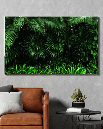 Vertical garden with tropical green leaf, contrast