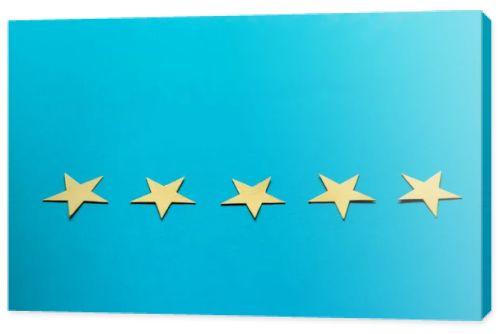 yellow stars isolated on blue with copy space