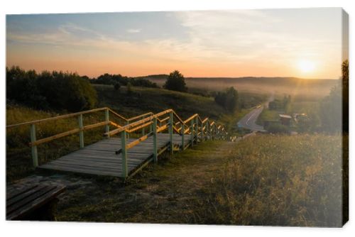 wooden stairs at sunset