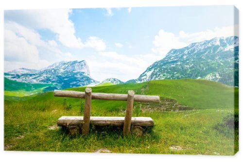 wooden bench with beautiful mountains in Durmitor massif, Montenegro