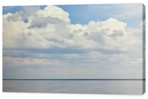 Landscape with river and white clouds on blue sky