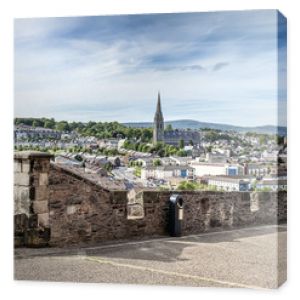 Londonderry, Northern Ireland: Skyline of Derry with St. Eugene's Cathedral near Free Derry Corner, city wall. horizon and blue sky